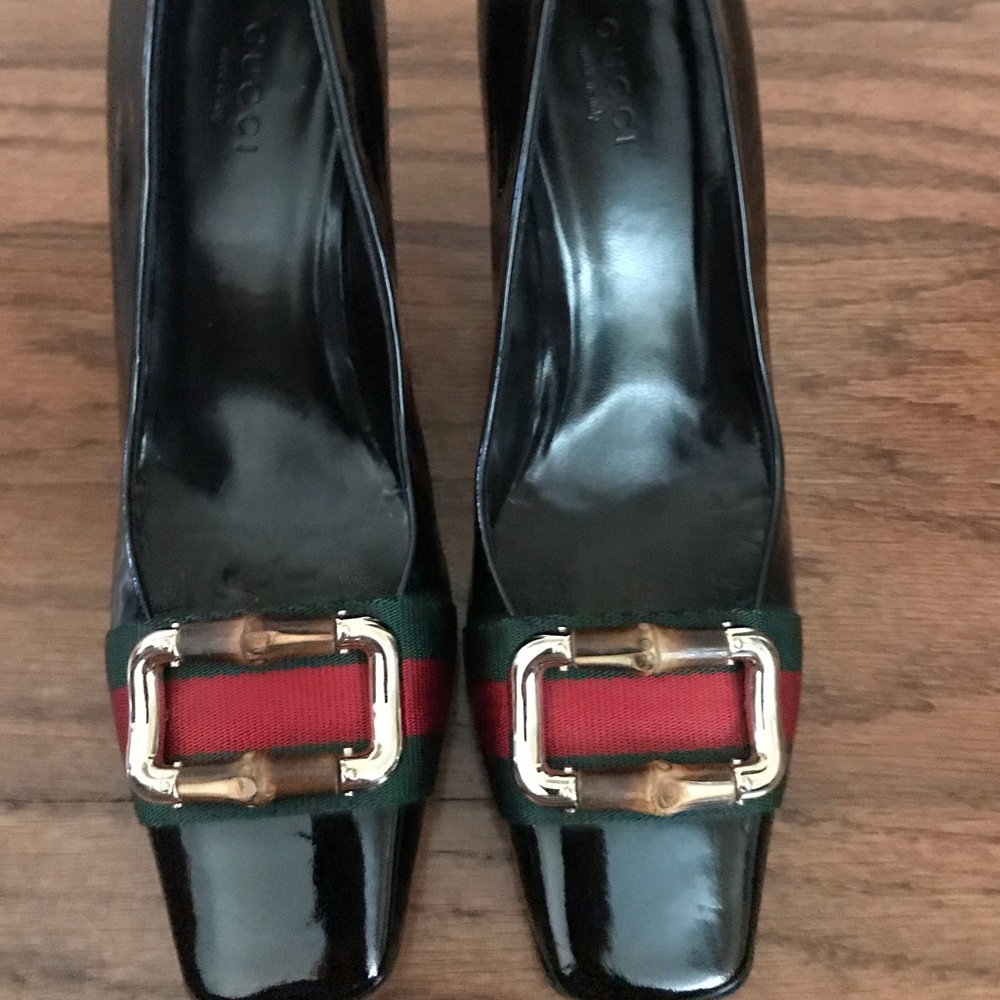 Gucci black patent leather pumps.
